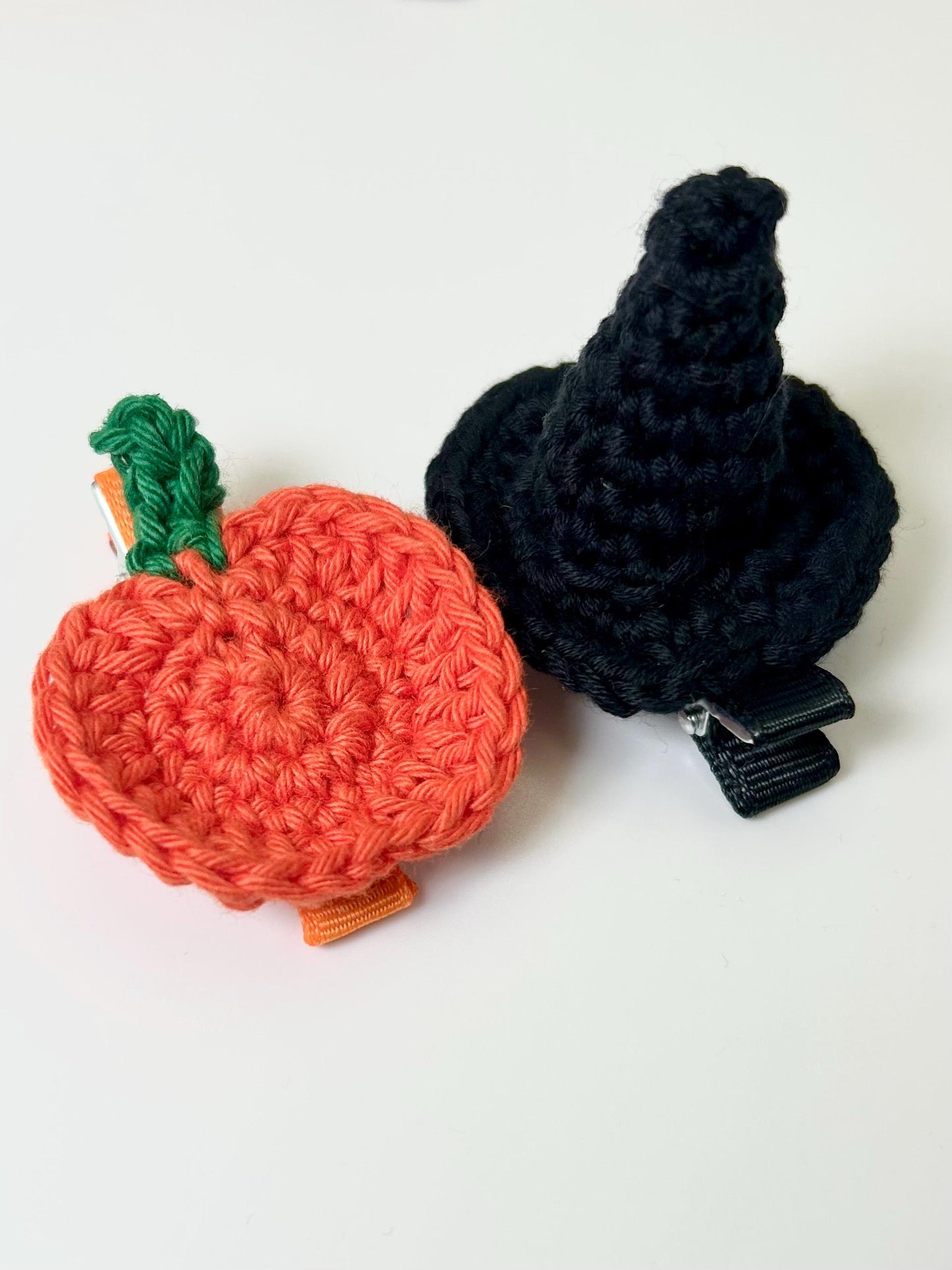 Halloween hair clips. Witch hat and pumpkin; glow in the dark ghosts.