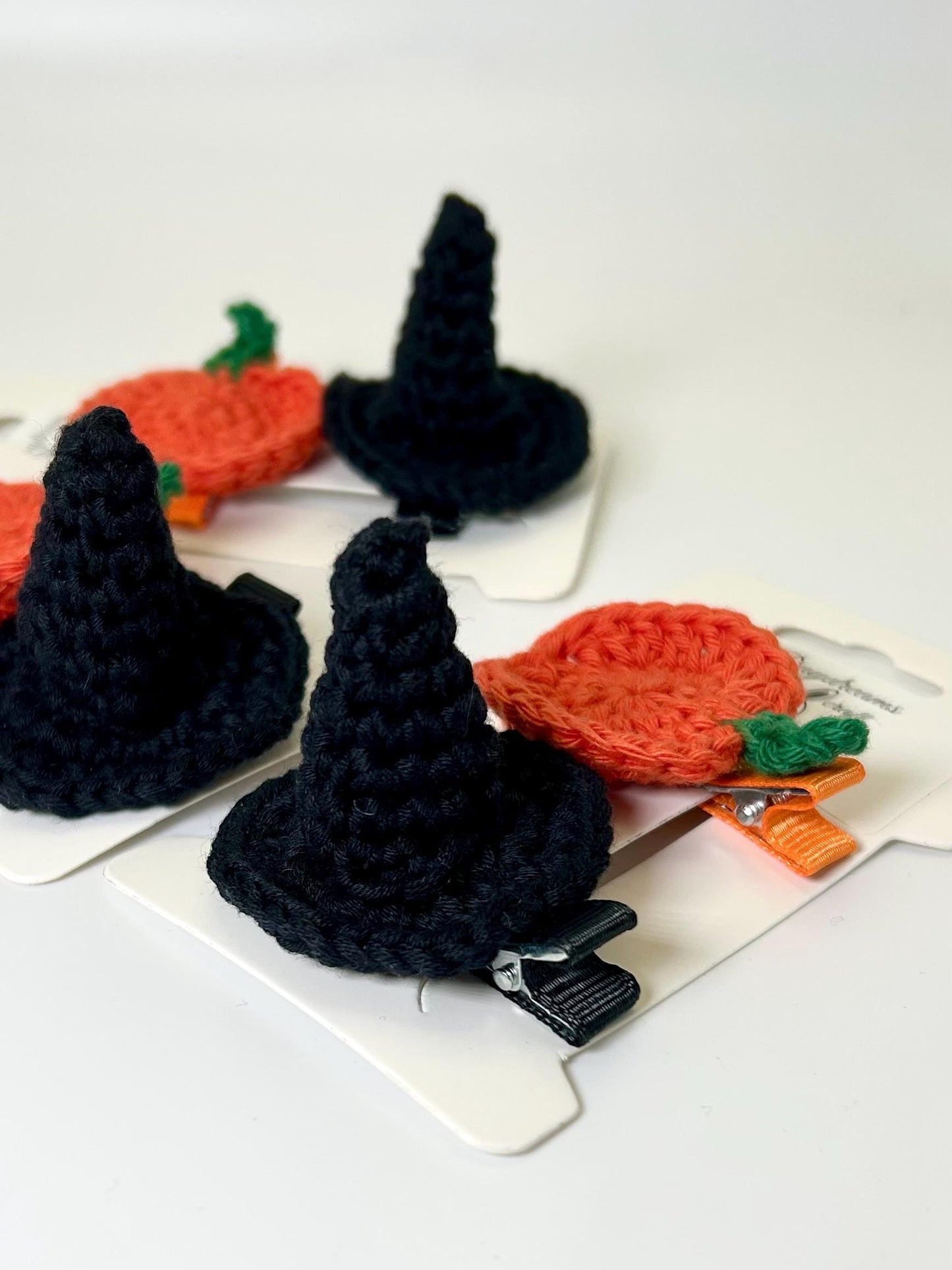 Halloween hair clips. Witch hat and pumpkin; glow in the dark ghosts.