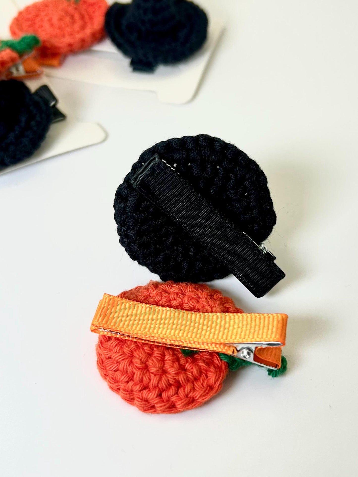 Halloween hair clips. Witch hat and pumpkin; glow in the dark ghosts.