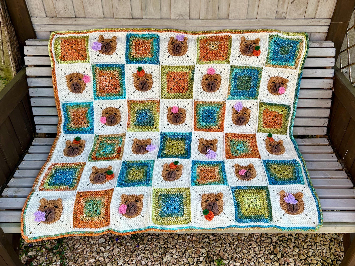 Capybara crochet blanket pattern. PDF download, UK and US terms. Bright colors.
